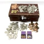 A quantity of various pre-decimal coinage to include half crown and shillings within a small brown