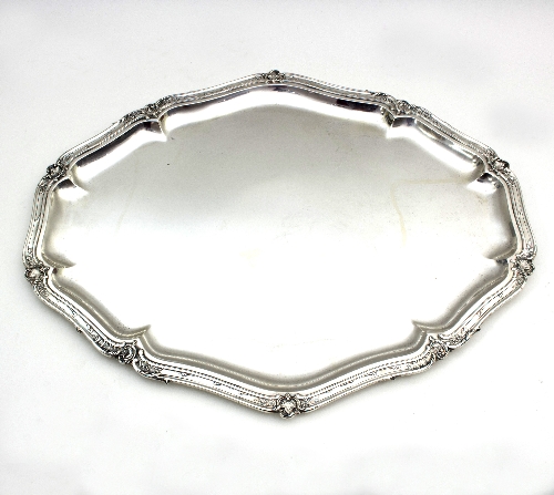 A Continental shaped oval silver tray with foliate scroll border, stamped 800 M,