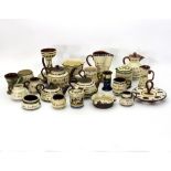 A large quantity of Torquay pottery, to include a chamberstick, three teapots,