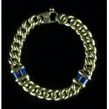 An 18ct gold link bracelet with two lapis lazuli column junctions,