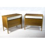 G-Plan, a pair of teak and painted bedside cabinets,