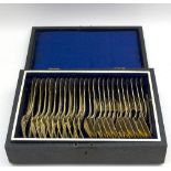 A German table service of fiddle and thread pattern flatware, comprising twelve table spoons,