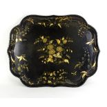 A 19th Century papier-mâché black lacquered tray, painted flowers in gilt,