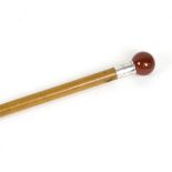 A Victorian malacca walking cane with silver collar and agate pommel