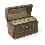 A tooled leather stationery box with domed cover decorated scallop shells, 21.