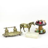 A brass desk inkstand, a brass model of a horse,