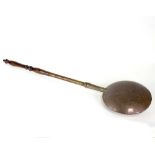 A 19th Century copper bed warming pan, with turned wooden handle,