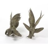 A pair of gilt metal cockerel table ornaments,