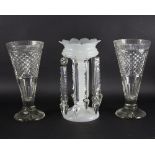 A pair of cut glass vases and an opaque glass centrepiece with prism drops