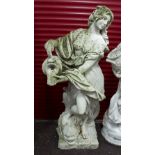 A reconstituted stone garden statue of a girl with pitcher,