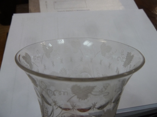 A glass goblet, circa 1760, engraved with vines on a hollow baluster stem and folded foot, 21. - Image 7 of 8