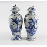 A pair of 19th Century blue and white vases, long Eliza's on a terrace and figures within interiors,