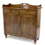 An early 19th Century mahogany chiffonier, fitted drawers above cupboards on turned feet,