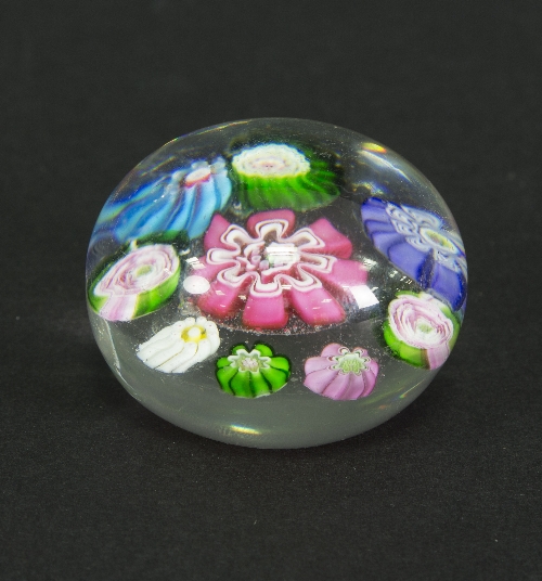 A Clichy miniature glass paperweight with spaced millefiori decoration, 4.