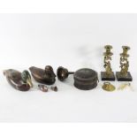 A pair of brass candlesticks with Renaissance figures to the bases, 23cm high, a japanned spice box,