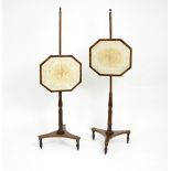 A pair of early 19th Century mahogany pole screens with octagonal needlework panels on triform