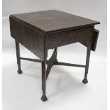 A 19th Century mahogany two-flap table with inlaid single drawer,