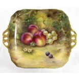 A Royal Worcester fruit painted plate, signed Moseley, with pierced gilt handles,