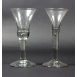 Two English wine glasses circa 1740, with plain stems,