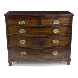 A Regency mahogany bowfront chest of two short over three long drawers, on ogee bracket feet,