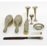 A pair of silver backed hairbrushes, London 1898, embossed cherubs,