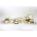 An Aynsley Gold Dowery dinner service, comprising sixteen dinner plates, sixteen dessert plates,