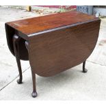 A mahogany oval drop leaf table, on cabriole legs with pad feet,