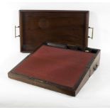 A mahogany tray with brass handles to each end,