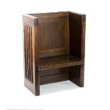 A late Victorian oak single seat pew,