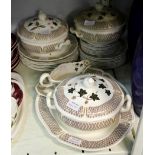 A Wedgwood Avocado pattern part dinner service to include tureens, meat plate etc.