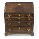 A George III oak bureau, the fitted interior above four long graduated drawers, on bracket feet,