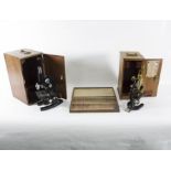 A cased set of early 20th Century medical microscope slides with inventory list within box,