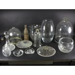 A quantity of glassware including light shades, vases and a paperweight decorated a seal,