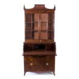 A George III mahogany and inlaid secretaire bookcase,