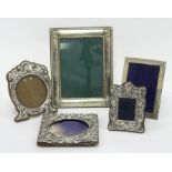Five silver photograph frames,