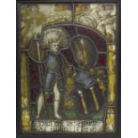 A 16th Century leaded stained glass panel, The Young Knight, with inscription and dated 1517,