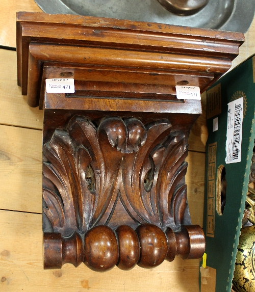 A mahogany wall bracket with acanthus scroll support,