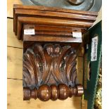 A mahogany wall bracket with acanthus scroll support,