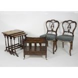 A pair of Victorian salon chairs with pierced carved backs, on moulded front legs,