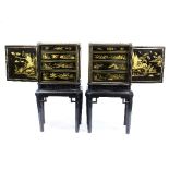 A near pair of late 19th Century black and gold lacquer cabinets on stands,