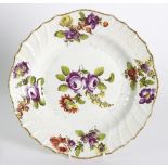 A Vienna plate with painted flowers and ozier moulded border, circa 1810,