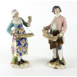 A pair of Samson Derby style figures, market sellers,