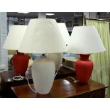 Four pottery lamps