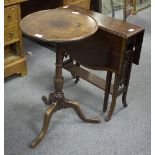 An early 19th Century mahogany tripod table,