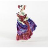 A Royal Doulton porcelain figure, Lady April, HN1958, initialled A P,