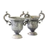 A pair of 18th Century style campana lead urns with twin-handles,