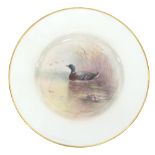 A Royal Worcester plate by Jas Stinton, painted a mallard on a pond, date code for 1940,