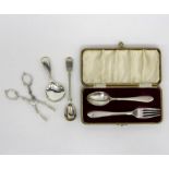 A silver Christening spoon and fork, EV, Sheffield 1931, a fiddle and thread pattern caddy spoon,