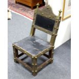 An Iberian brass mounted rosewood and leather covered side chair