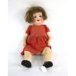 A Heubach Koppelsdorf bisque head doll, with sleepy eyes, open mouth, teeth and tongue,